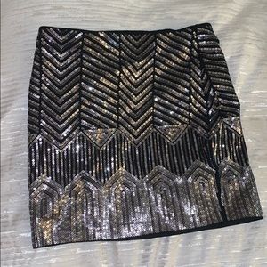 Black sequin skirt, with gold and silver sequins
